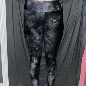 blue and black marble like butt scrunch leggings